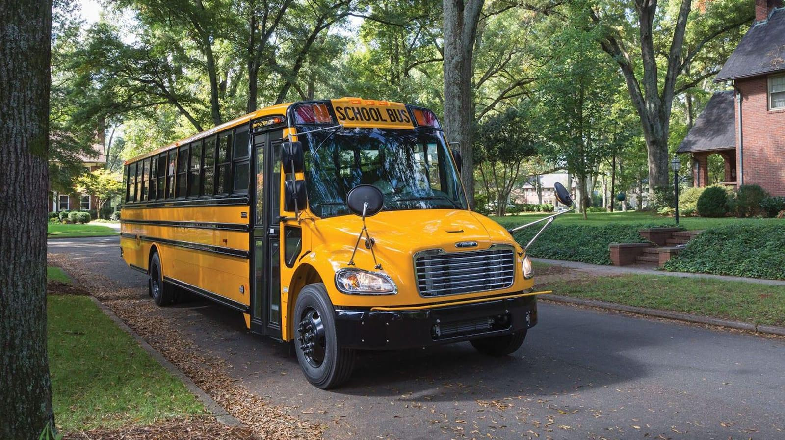 School bus for front and rear compliance camera planning