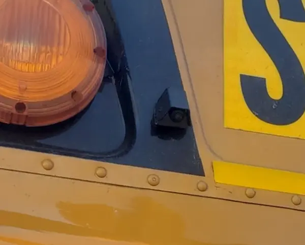 Exterior vehicle camera mounted on a school bus